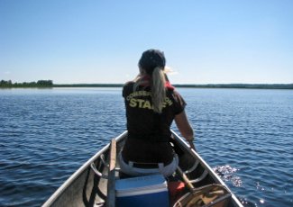 Staff in canoe